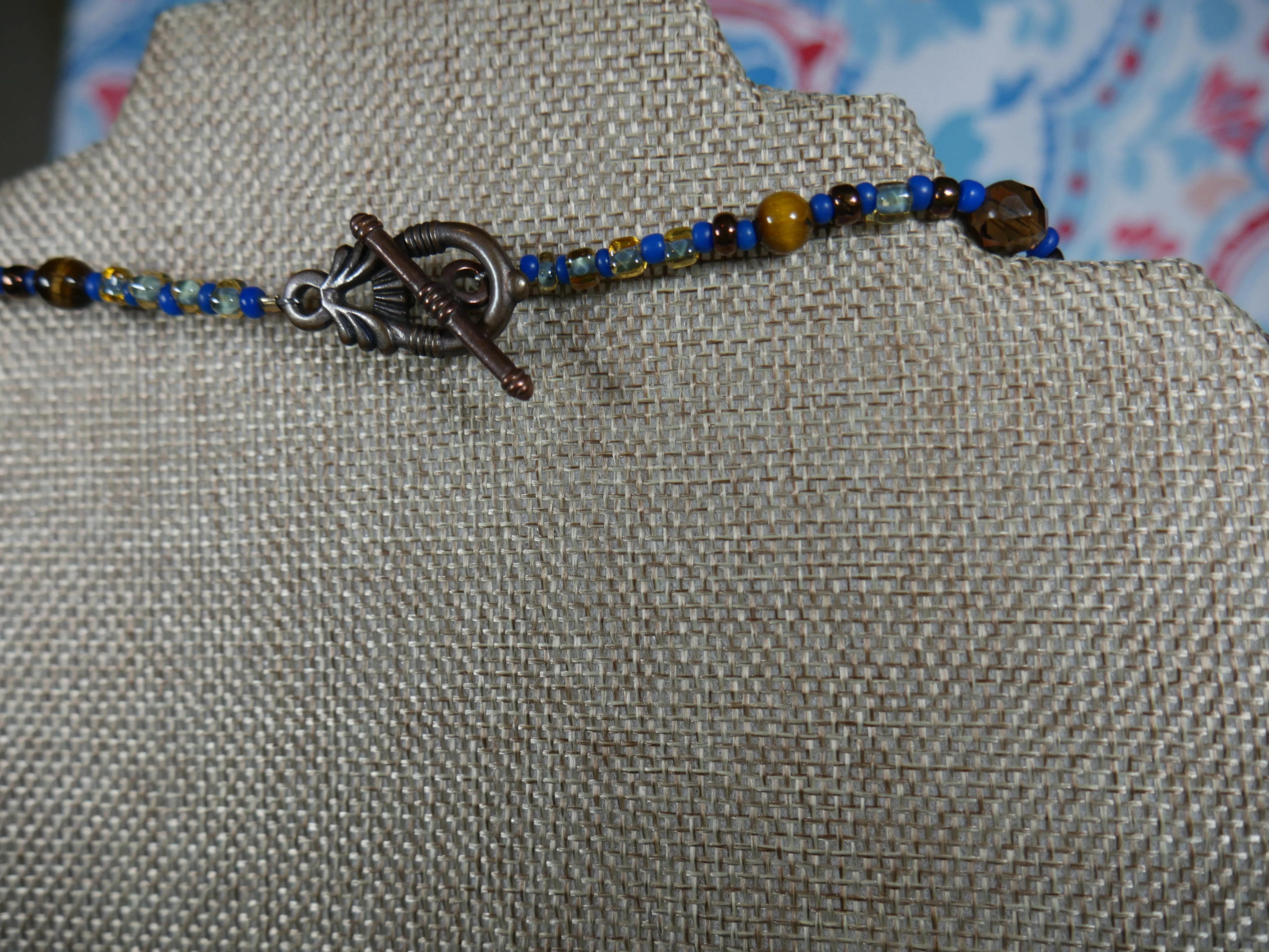 Bronze, Coppery, Brown and Blue Ocean-Themed Beaded Necklace with Tiger Eye and Seahorse Pendant